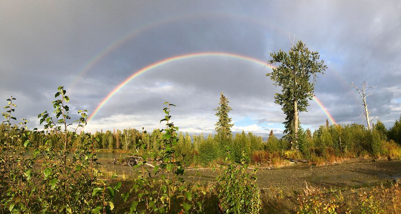 The pot of gold at the end of this rainbow is the memories you've made with family and friends on a guided Alaska rafting tour